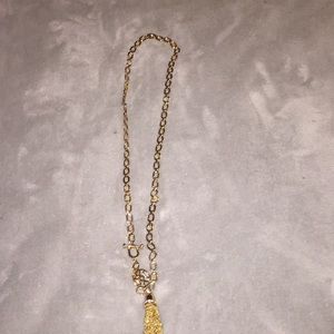 Iva now is trump 20 inch gold chain , with tassel